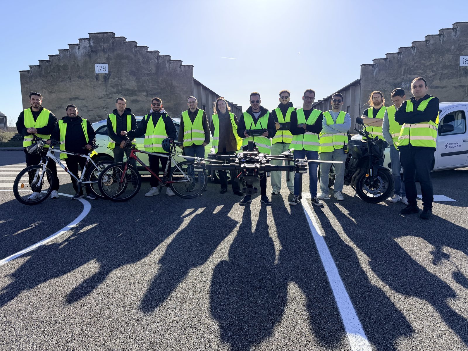 iDriving partners at the Transpolis test track with the bicycles, motorbike and vehicles used in the pilot scenarios